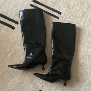 Knee high patent boots